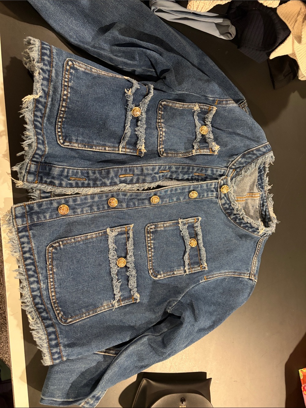 Women’s jean jacket with gold
